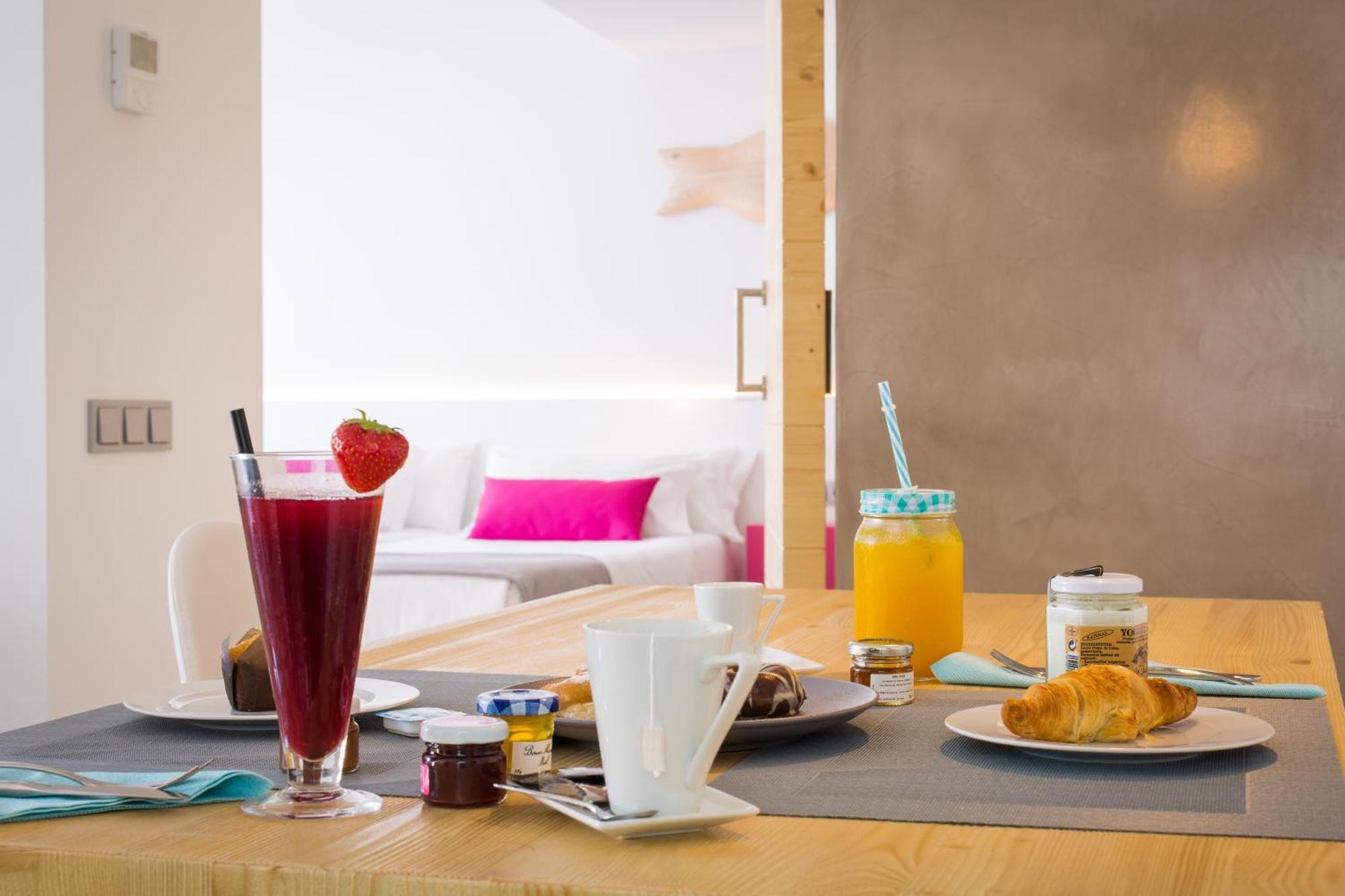 One Ibiza Suites Exterior photo A typical breakfast